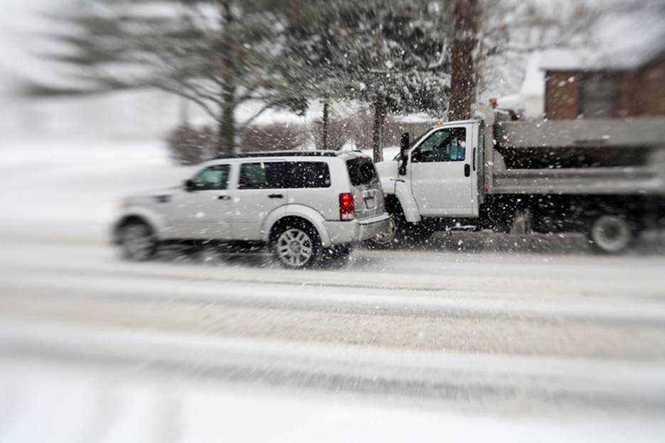 A truck with a broken down door
AI-generated content may be incorrect.